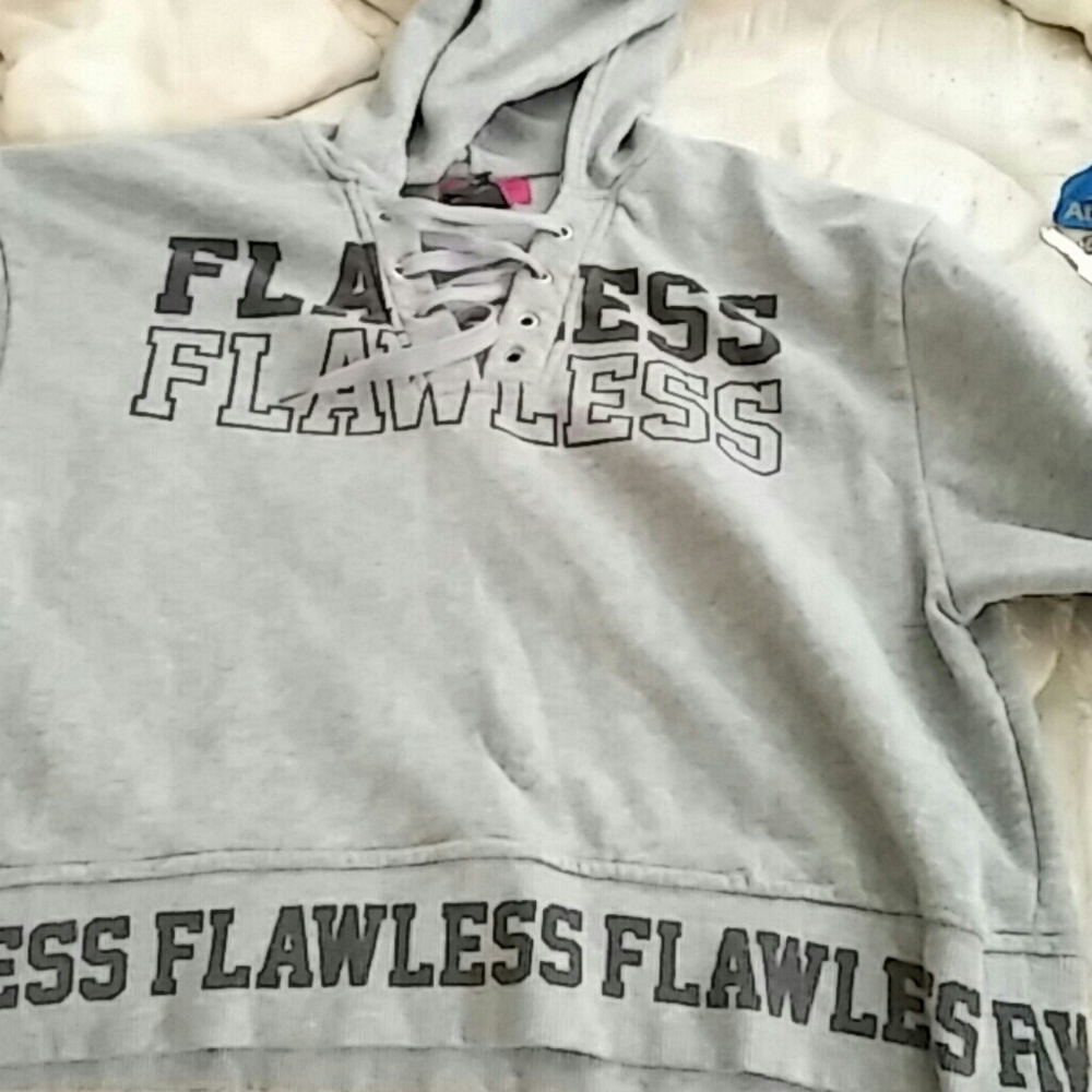 Somewhat of a tanktop but more of a Sweat shirt
